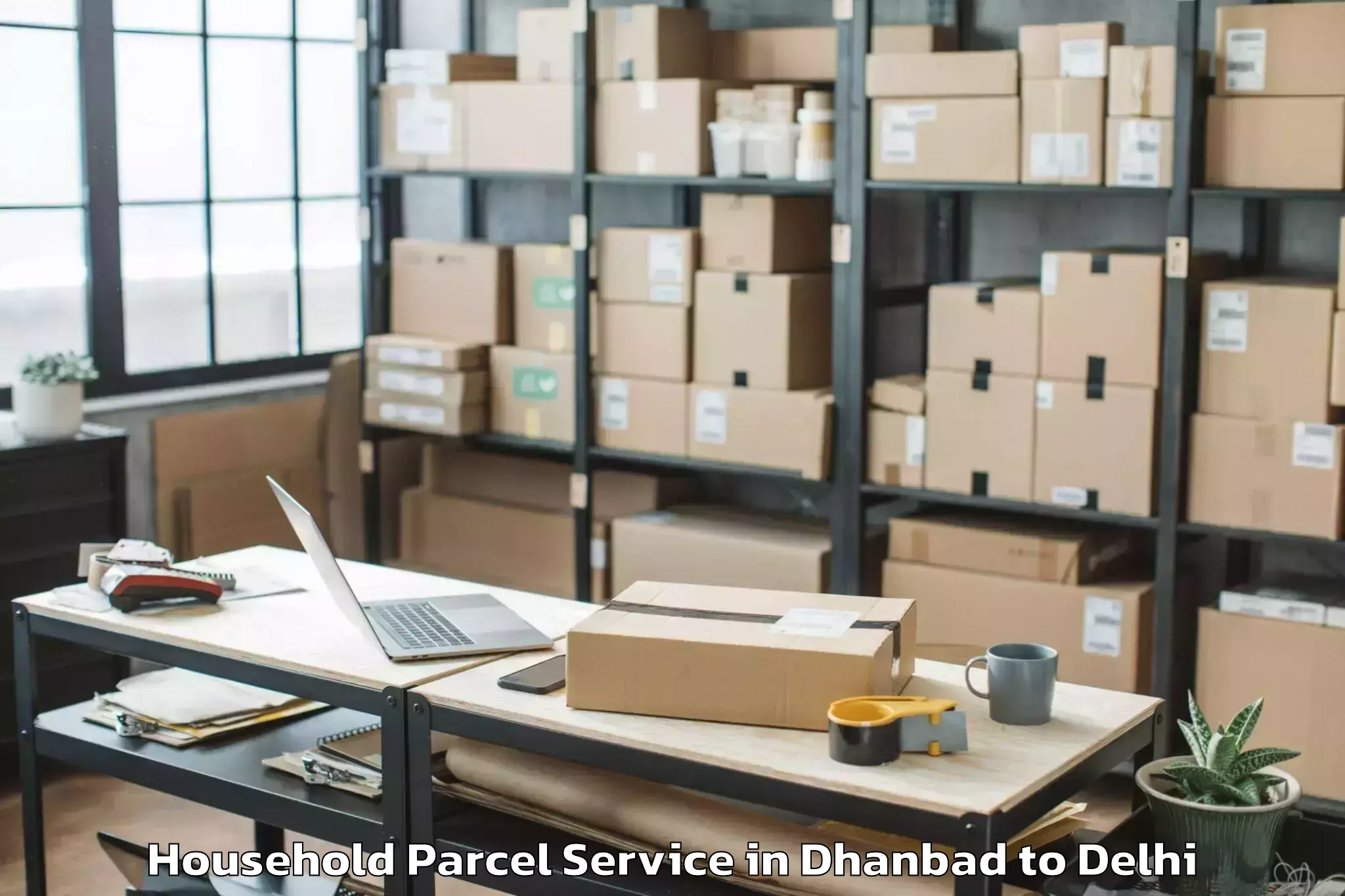 Book Dhanbad to Ambience Mall Rohini Household Parcel